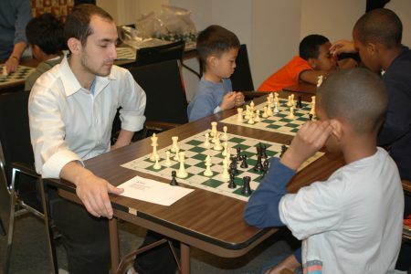 Alex Eltobgi teaching chess